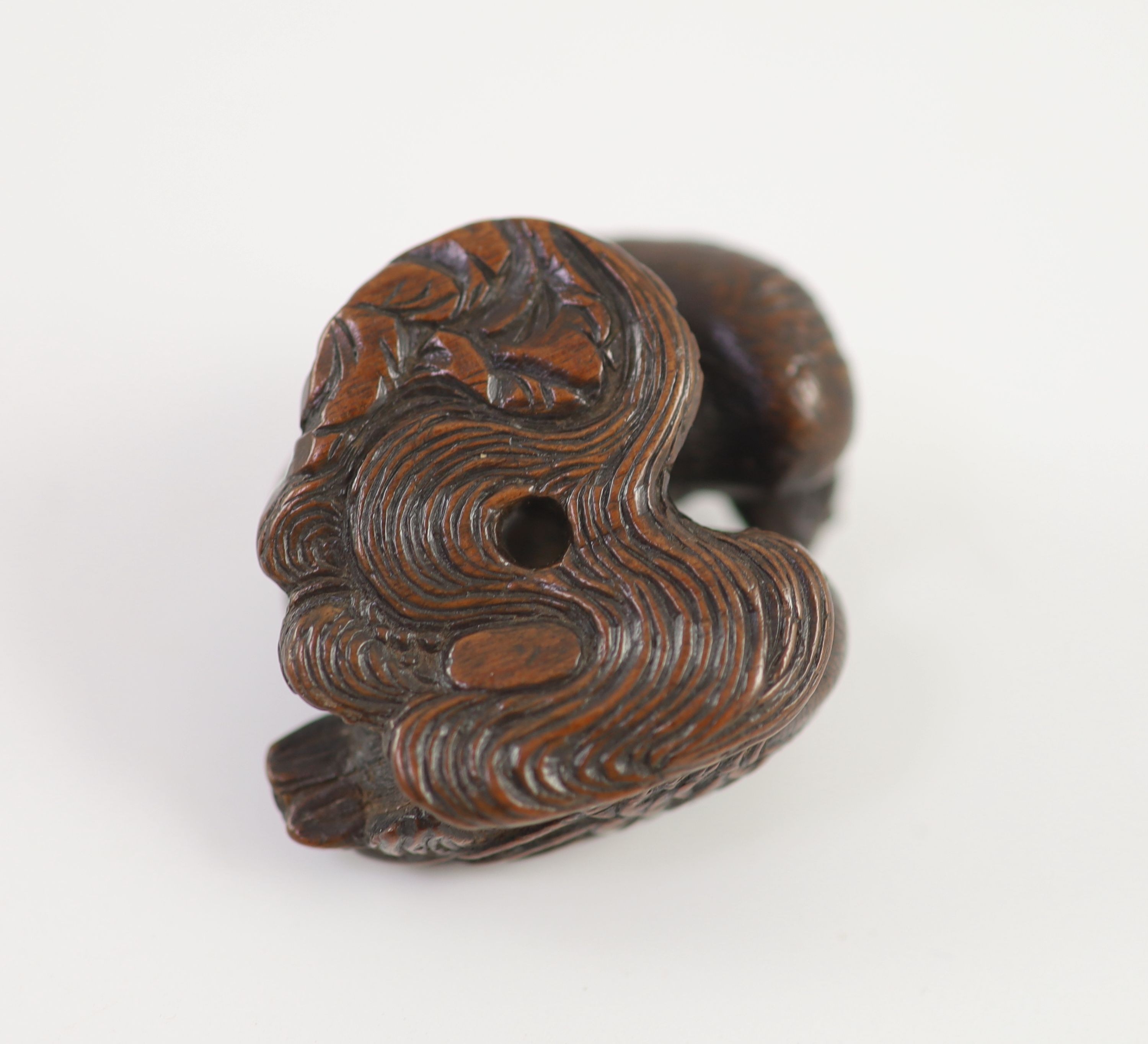 A Japanese wood netsuke of a male and female mandarin duck (oshidori), School of Yamaguchi Okatomo, 19th century, 4cm long